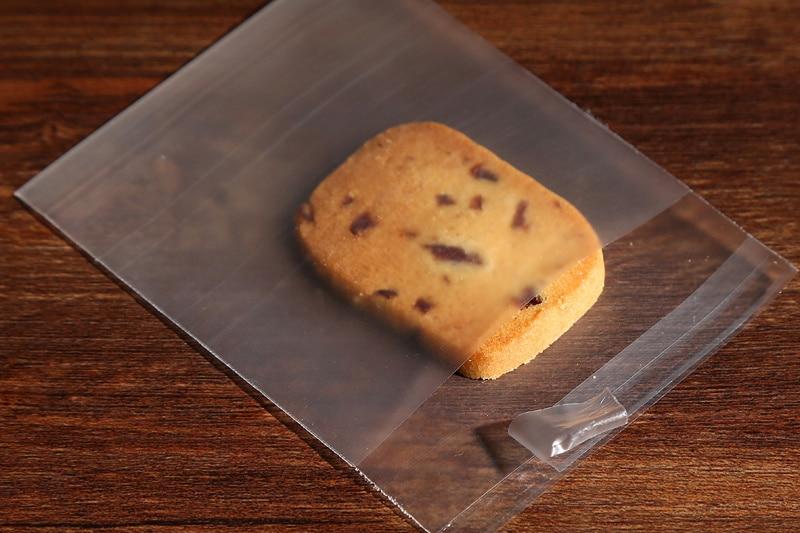 100pcs 10*10+3cm Cookie Candy Bags Home Christmas Wedding Decoration Self Adhesive Food Plastic Packing OPP Gift Bag 100pcs 10*10+3cm Cookie Candy Bags Home Christmas Wedding Decoration Self Adhesive Food Plastic Packing OPP Gift Bag