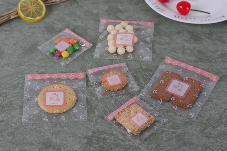 100pcs 10*10+3cm Cookie Candy Bags Home Christmas Wedding Decoration Self Adhesive Food Plastic Packing OPP Gift Bag 100pcs 10*10+3cm Cookie Candy Bags Home Christmas Wedding Decoration Self Adhesive Food Plastic Packing OPP Gift Bag