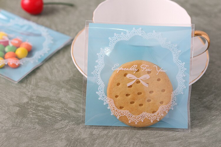 100pcs 10*10+3cm Cookie Candy Bags Home Christmas Wedding Decoration Self Adhesive Food Plastic Packing OPP Gift Bag 100pcs 10*10+3cm Cookie Candy Bags Home Christmas Wedding Decoration Self Adhesive Food Plastic Packing OPP Gift Bag