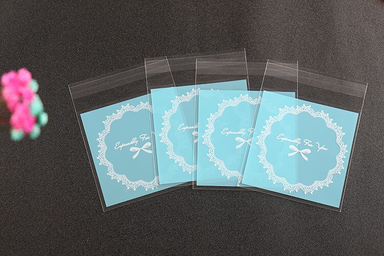 100pcs 10*10+3cm Cookie Candy Bags Home Christmas Wedding Decoration Self Adhesive Food Plastic Packing OPP Gift Bag 100pcs 10*10+3cm Cookie Candy Bags Home Christmas Wedding Decoration Self Adhesive Food Plastic Packing OPP Gift Bag
